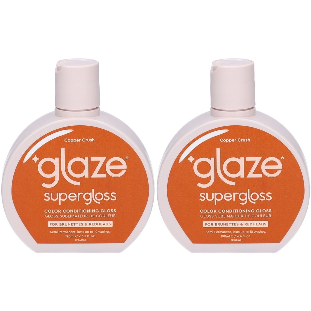Twee flessen met witte dop en oranje etiket. Opschrift: glaze supergloss, Copper Crush, voor brunettes & roodharigen.