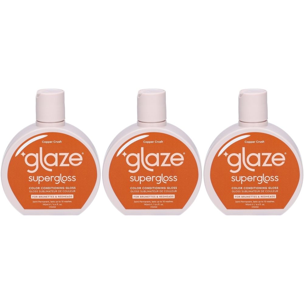 Drie flessen Glaze Supergloss Copper Crush. Kleurglans voor brunettes en roodharigen. Witte flessen met oranje etiket.