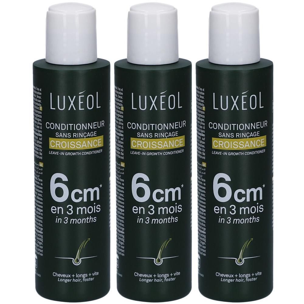 Drie flessen conditioner met witte dop. Opschrift: LUXÉOL, Conditioner zonder uitspoelen, Groei, 6 cm in 3 maanden.