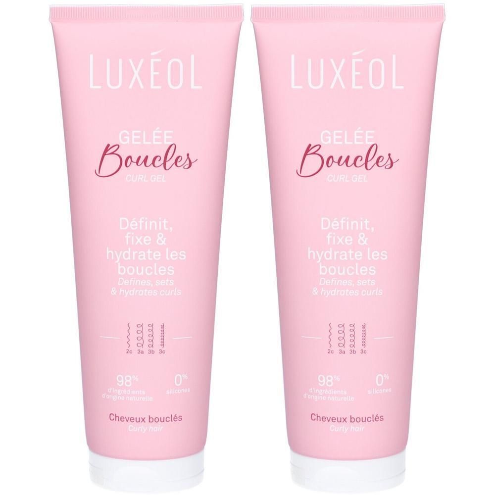 Deux tubes roses de LUXÉOL Gelée Boucles. Inscription: Gelée Boucles, Définit, fixe & hydrate les boucles. 98% ingrédients d'origine naturelle.