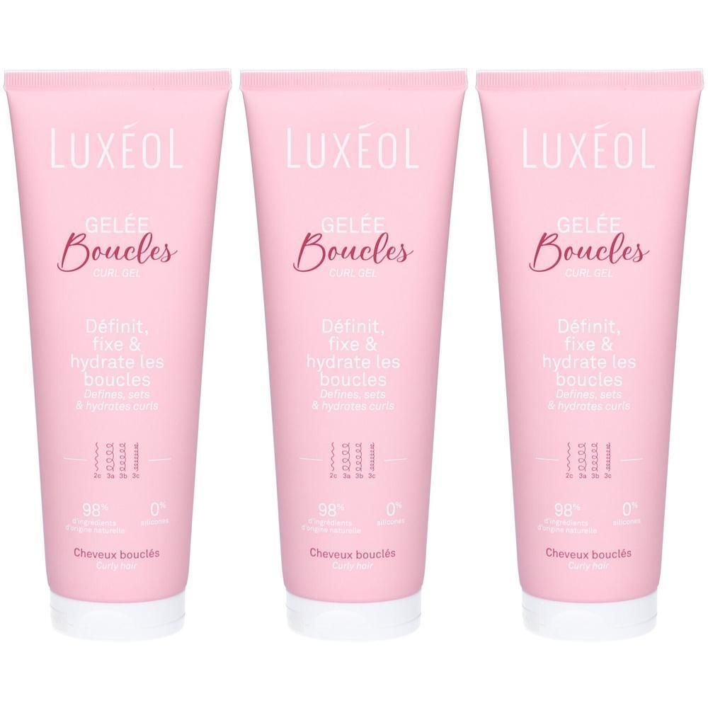 Trois tubes roses LUXÉOL Gelée Boucles. Inscription: Gelée Boucles, Définit, fixe & hydrate les boucles. 98% ingrédients d'origine naturelle.