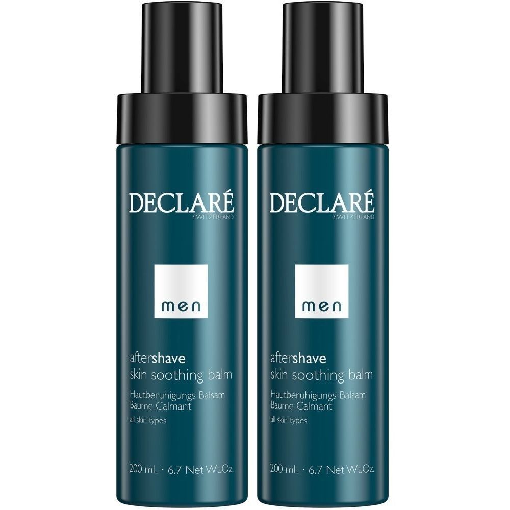 Twee flessen DECLARÉ Men Aftershave balsem. Donkerblauwe flessen met zwarte dop. Tekst: Aftershave, huidverzachtende balsem, Baume Calmant.