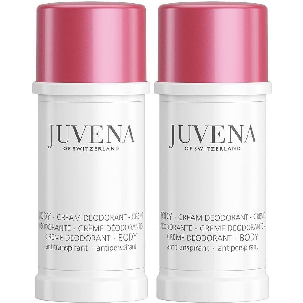 Deux déodorants blancs avec couvercles roses. Inscription: JUVENA OF SWITZERLAND, BODY CREAM DEODORANT.