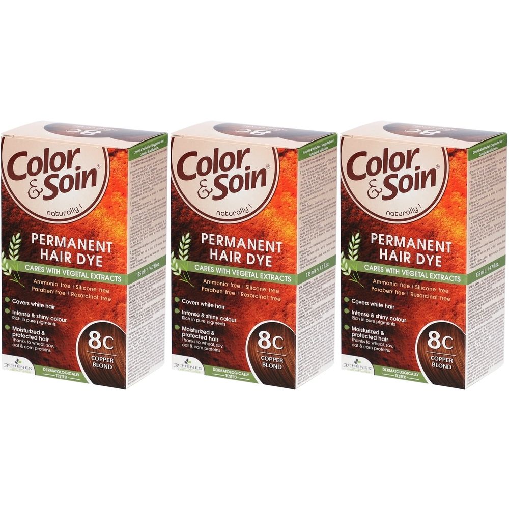 Trois boîtes de coloration Color & Soin. Inscription: Permanent Hair Dye, 8C Copper Blond. Emballage avec extraits végétaux.