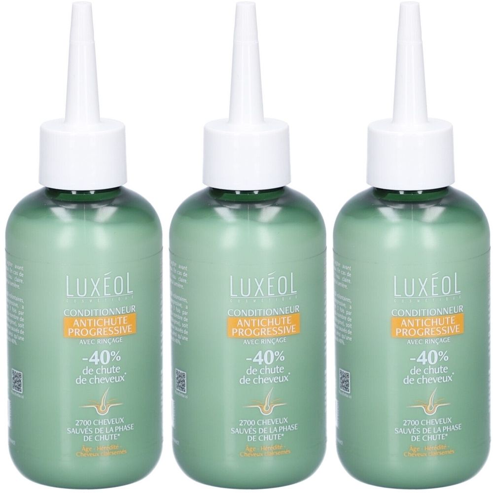 Drie groene flessen LUXÉOL Conditioner tegen haaruitval. Witte punt, gele strook met tekst. -40% de chute de cheveux.