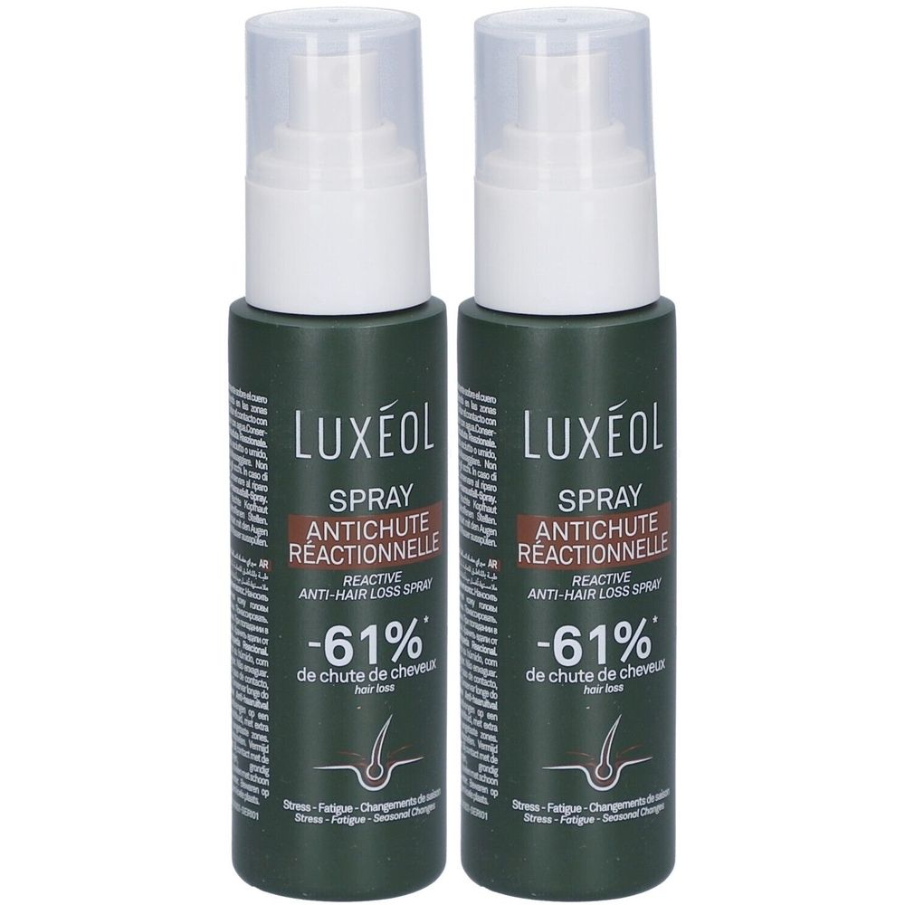 Twee groene sprayflacons met witte doppen. Opschrift: LUXÉOL Spray Antichute Réactionnelle, -61% de chute de cheveux.