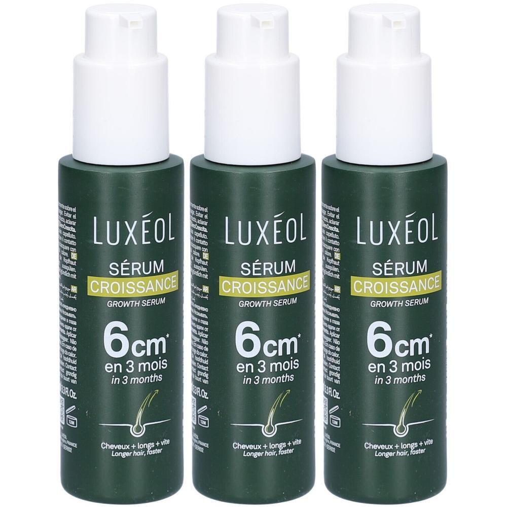 Trois flacons de sérum LUXÉOL. Flacons verts avec pompe blanche. Inscription: Sérum Croissance, 6cm en 3 mois.