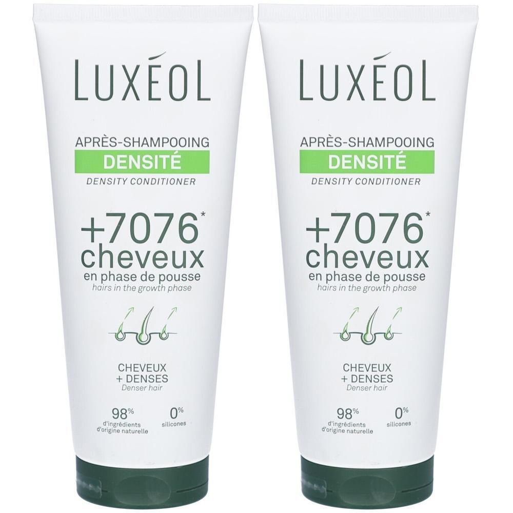 Twee tubes LUXÉOL conditioner. Wit, met groene en zwarte accenten. Tekst: Après-shampooing densité, +7076 cheveux.