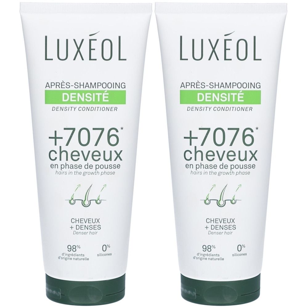 Twee tubes LUXÉOL conditioner. Wit, met groene en zwarte accenten. Tekst: Après-shampooing densité, +7076 cheveux.