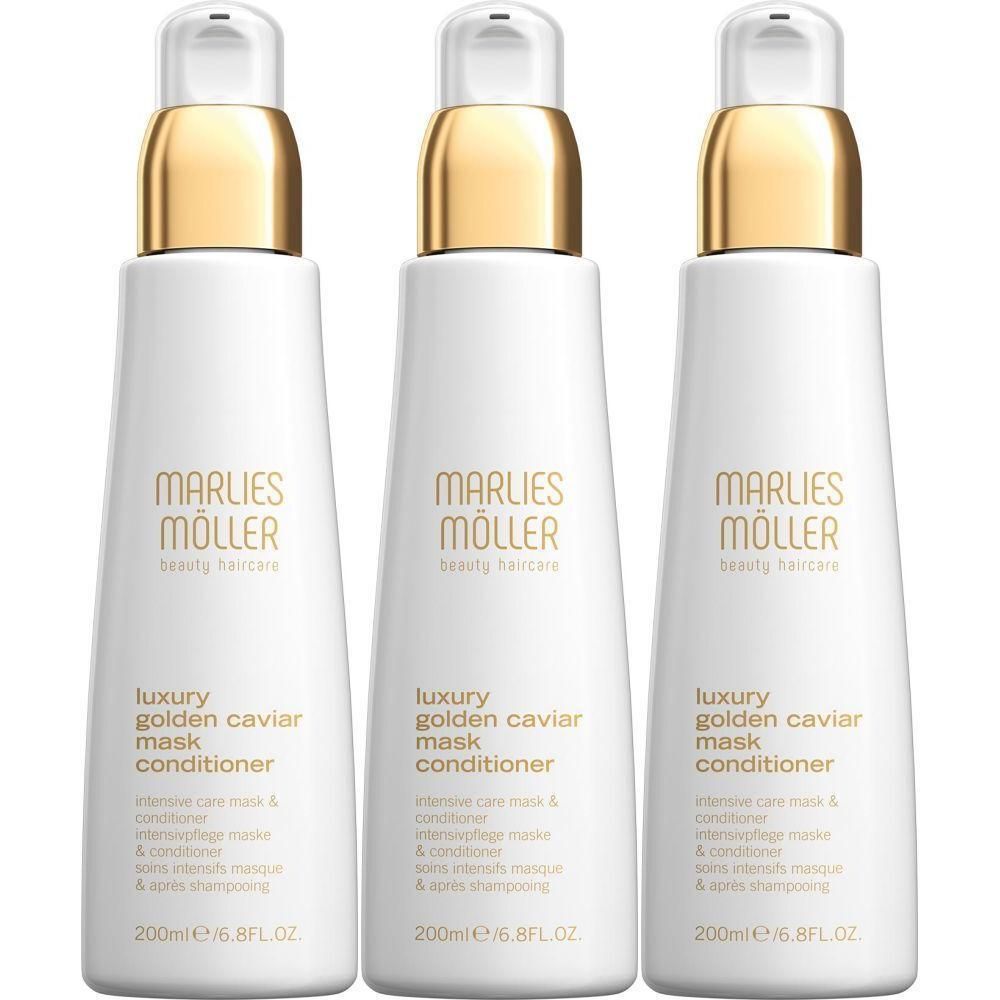 Drie witte flessen met gouden doppen. Opschrift: Marlies Möller, Luxury Golden Caviar Mask Conditioner.