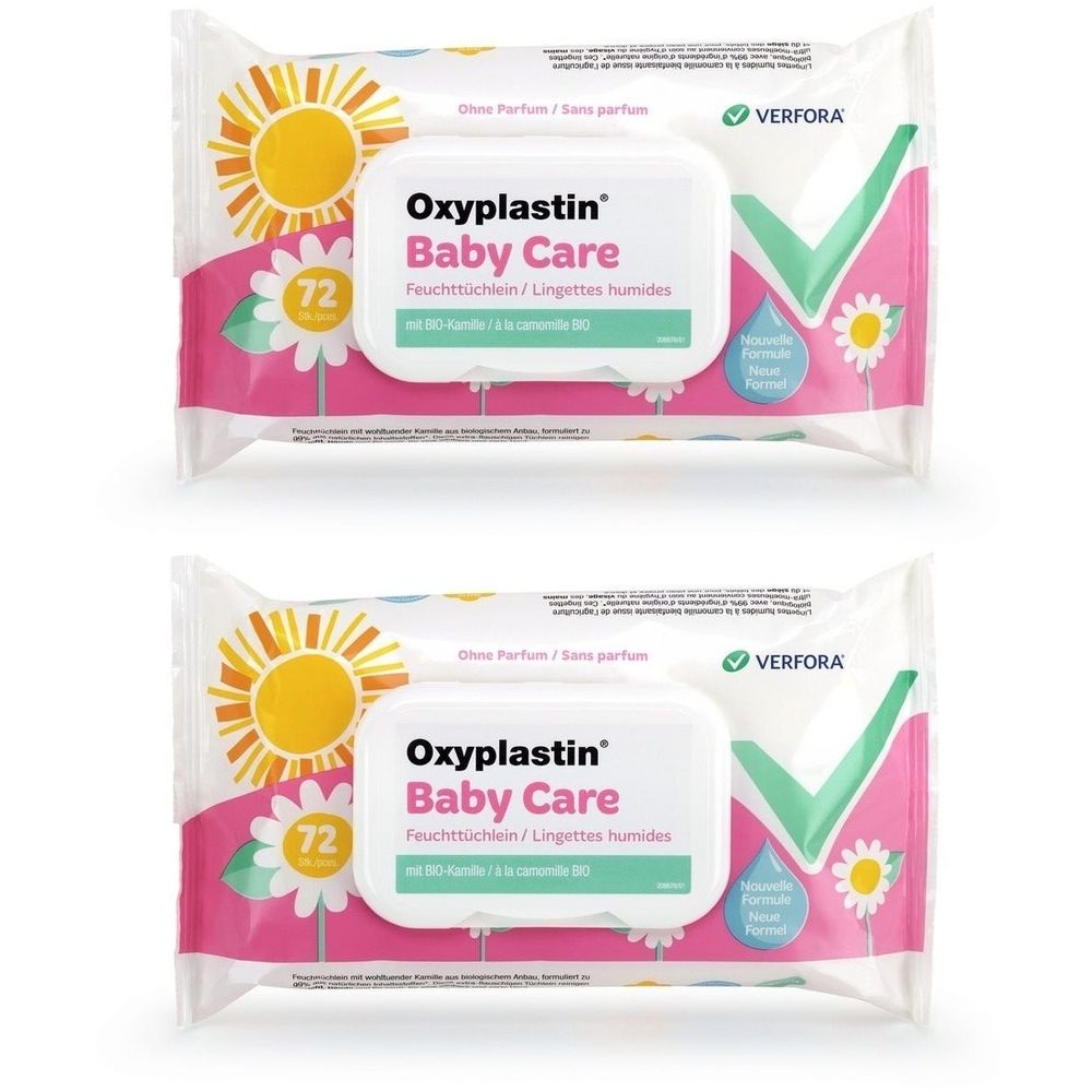 Deux paquets de lingettes Baby Care. Emballage blanc avec éléments roses et jaunes. Inscription : Oxyplastin Baby Care.