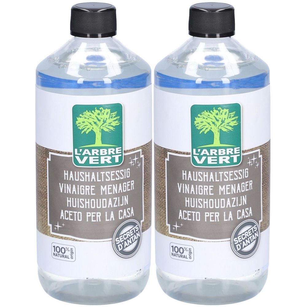 Twee flessen met zwarte dop. Het etiket toont "L'ARBRE VERT" en "HUISHOUDAZIJN".