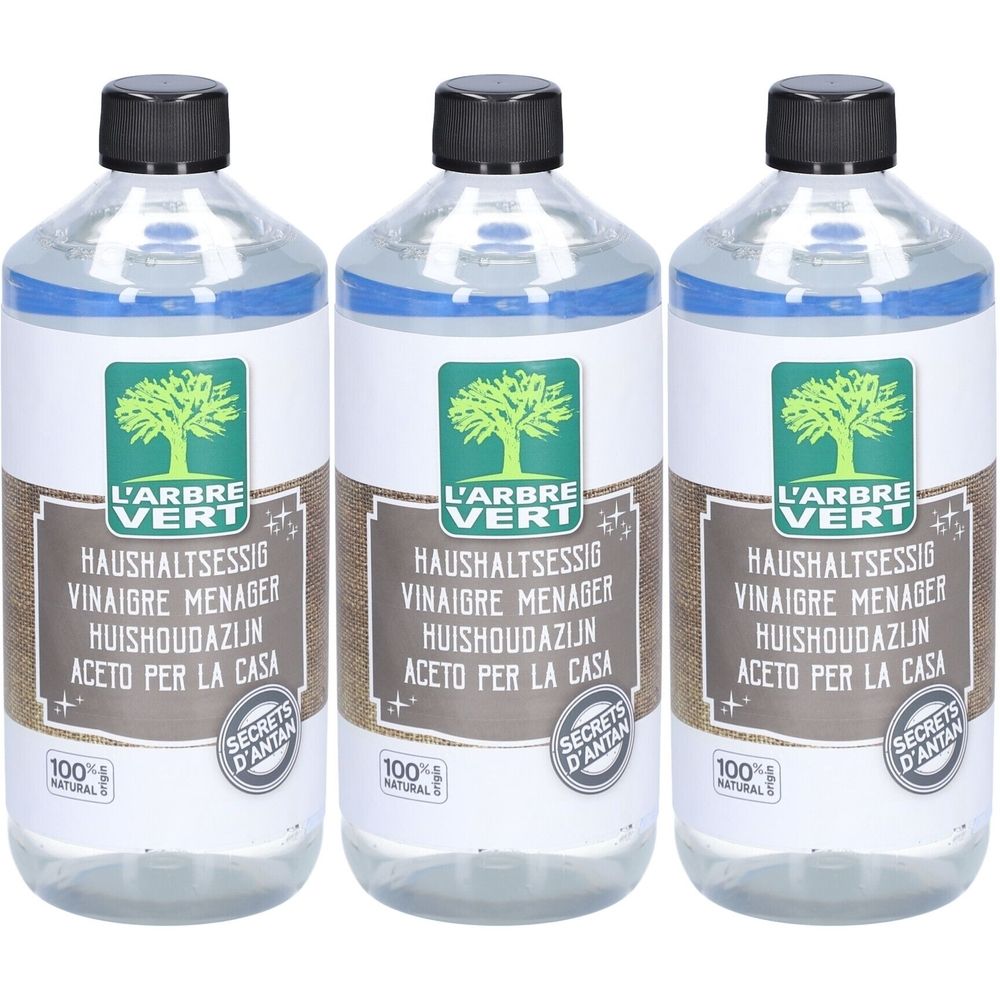 Drie flessen met zwarte doppen. Labels met "L'ARBRE VERT" en "HUISHOUDAZIJN".