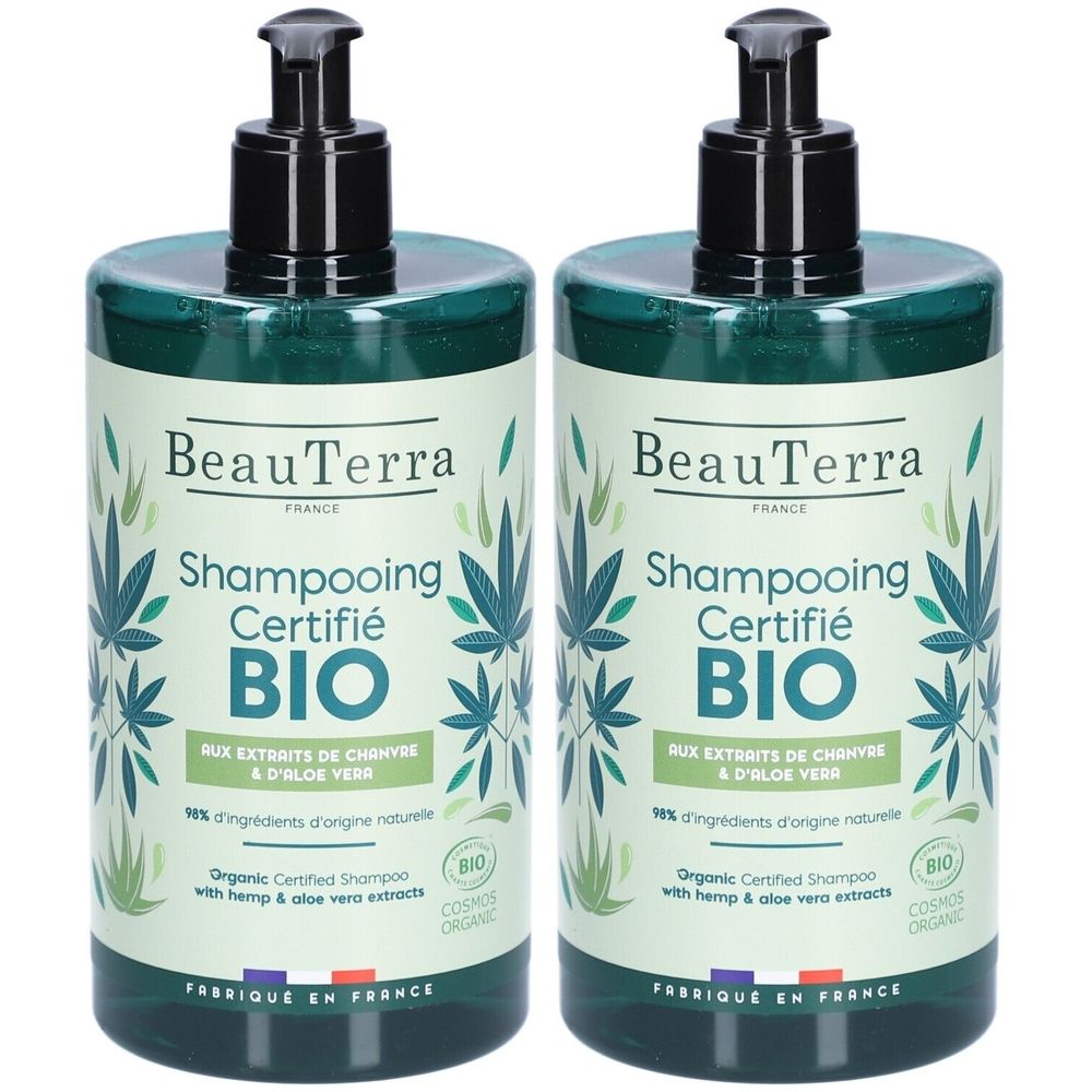 Twee groene shampoo flessen met zwarte pompen. Opschrift: BeauTerra, Shampooing Certifié BIO, hennep- en aloë vera extracten.
