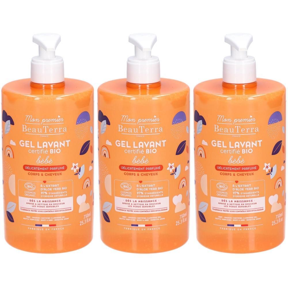 Drie flessen babywasgel met pomp. Oranje flessen met witte dop. Opschrift: BeauTerra Bio.