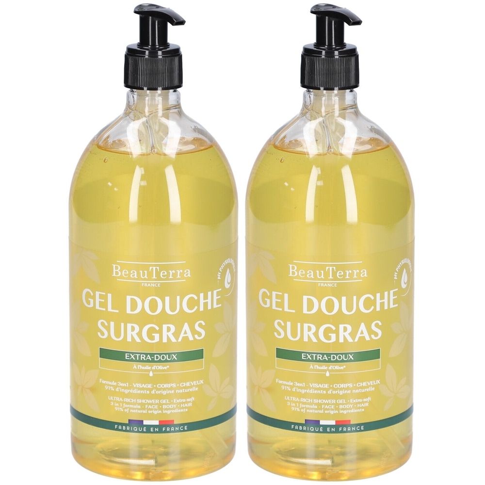 Twee transparante flessen gele douchegel. Zwarte pompkop. Opschrift: Gel Douche Surgras, Extra-Doux. Gemaakt in Frankrijk.
