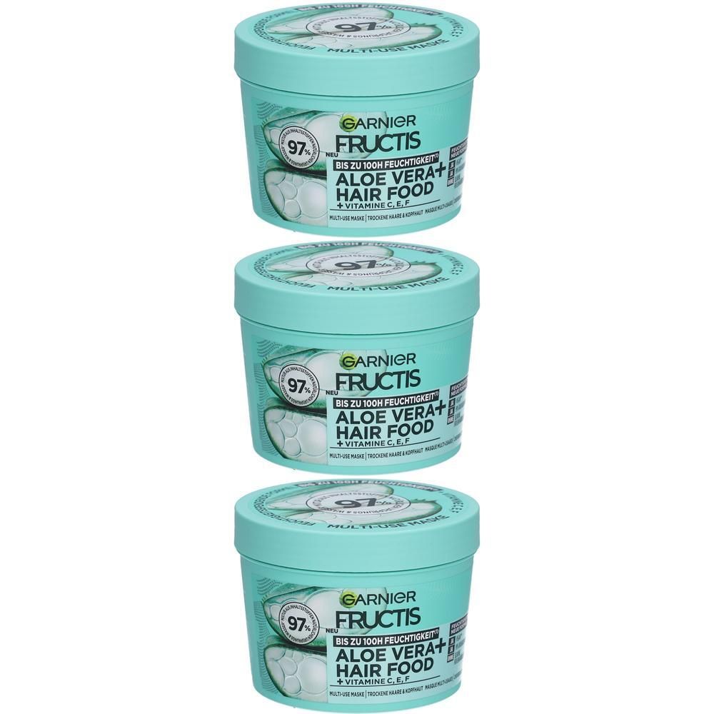 Trois pots turquoise avec couvercles. Inscription : Garnier Fructis Hair Food Aloe Vera. 97% d'origine naturelle.
