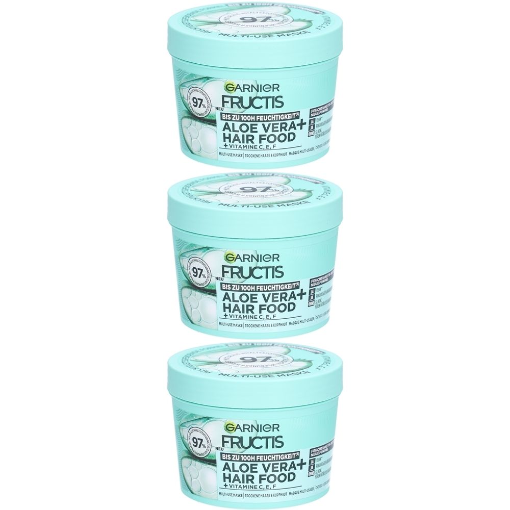 Drie turquoise potten met deksels. Opschrift: Garnier Fructis Hair Food Aloe Vera. 97% van natuurlijke oorsprong.