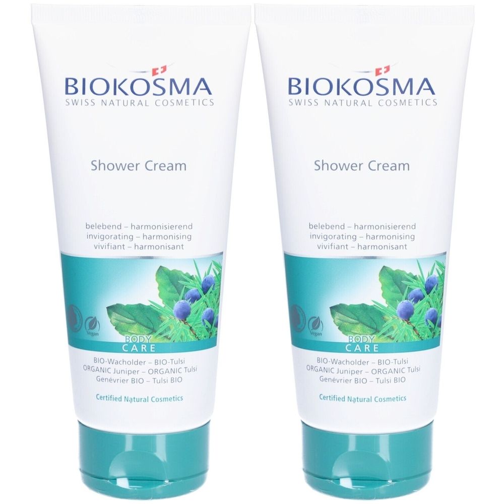 Deux tubes de crème de douche. Blanc, avec des accents bleu-vert. Inscription: Biokosma, Shower Cream, BIO-Wacholder & BIO-Tulsi.