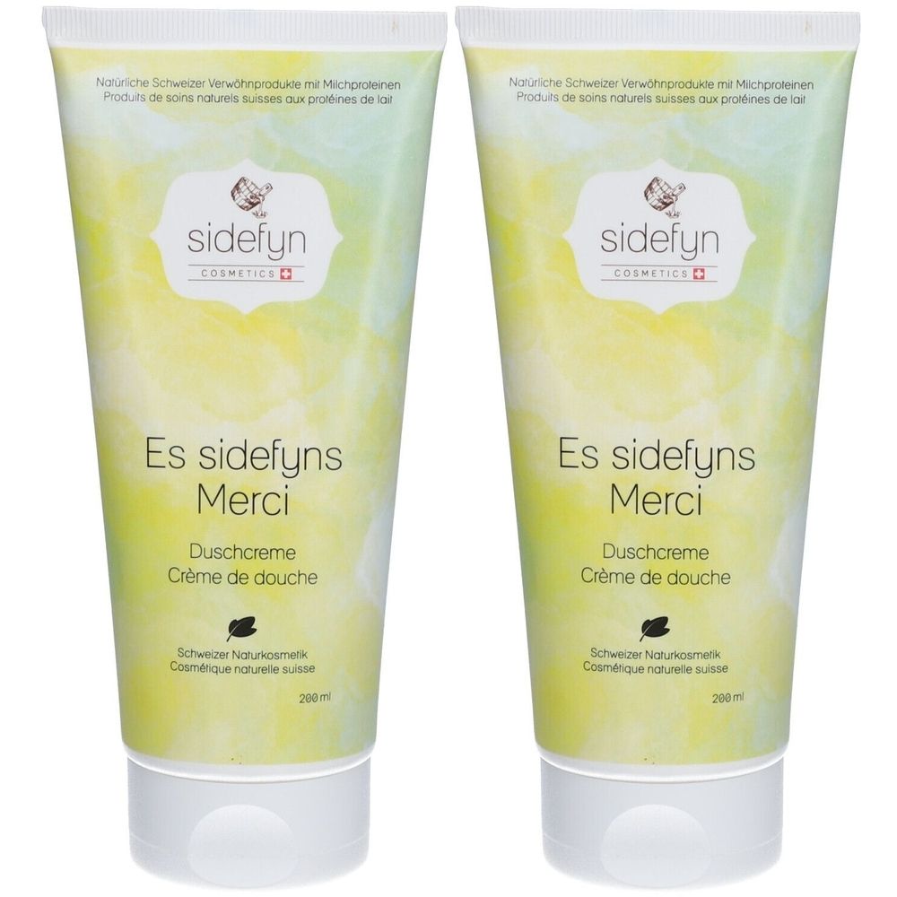 Twee tubes douchecrème. Opschrift: Es sidefyns Merci, Duschcreme, Crème de douche. Merk: sidefyn.