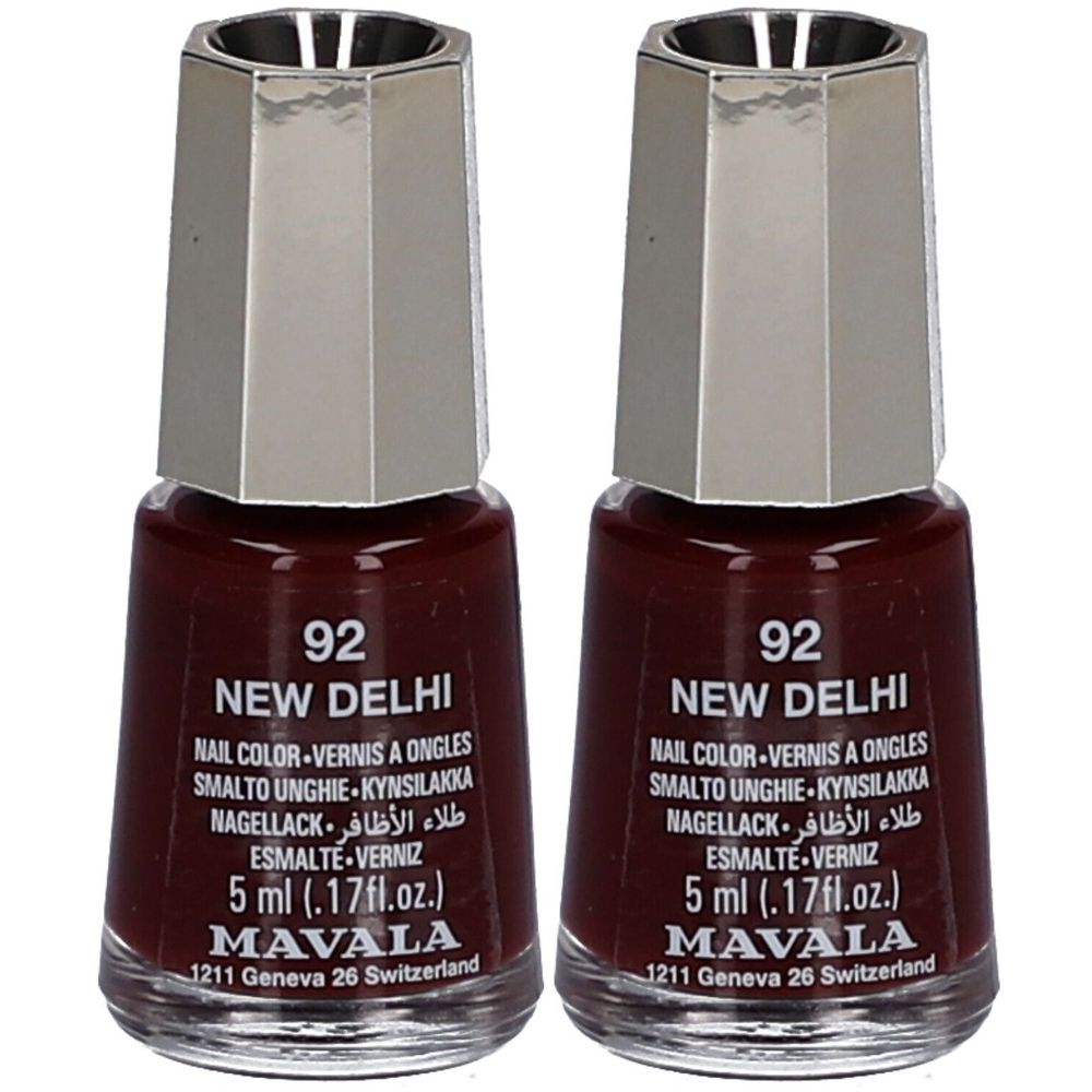 Deux flacons de vernis à ongles rouge foncé. Inscription : 92 NEW DELHI, MAVALA. Bouchon métallique. 5 ml.