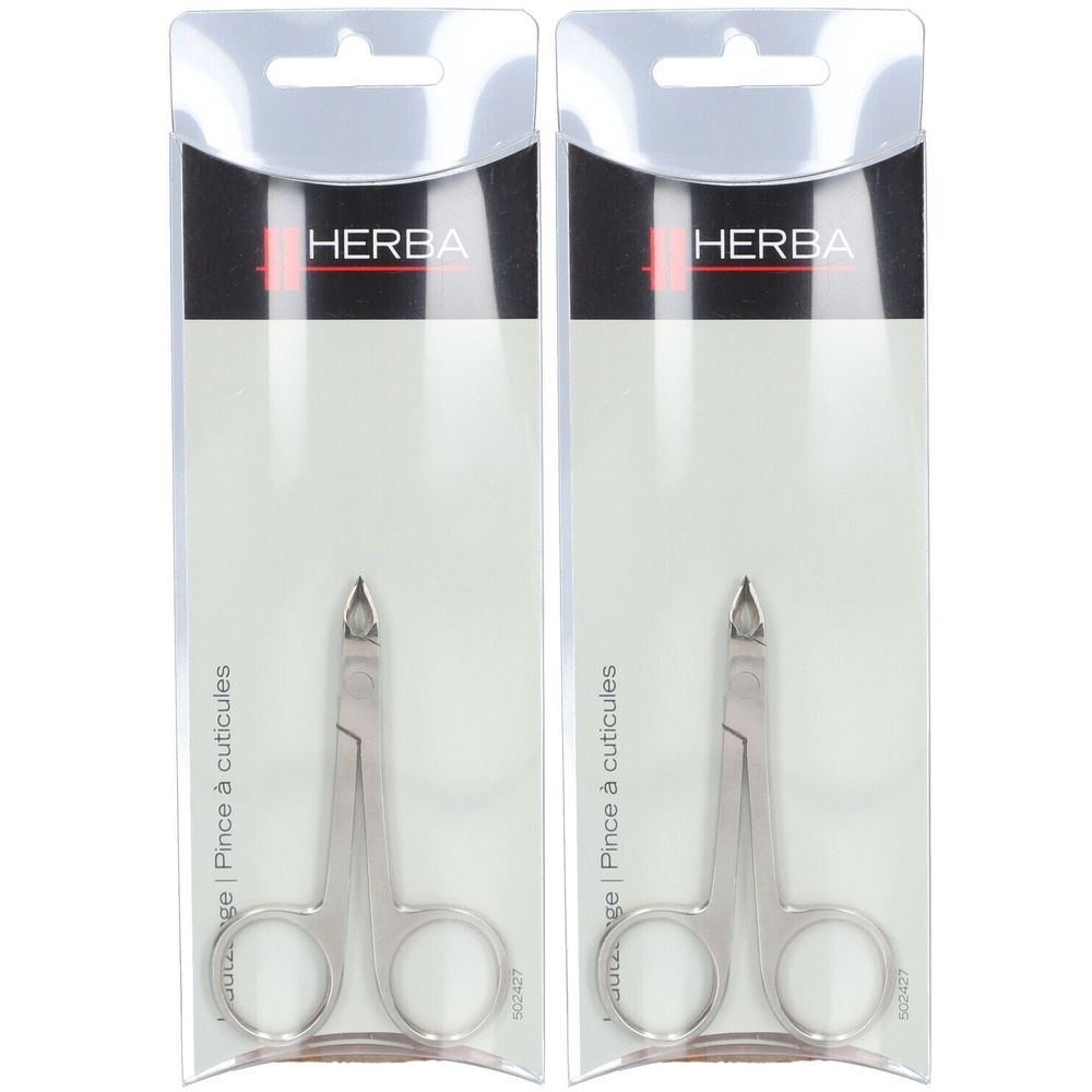 Twee HERBA nagelriemtangetjes in verpakking. Metaalkleurig, met afgeronde handgrepen en puntige punt.