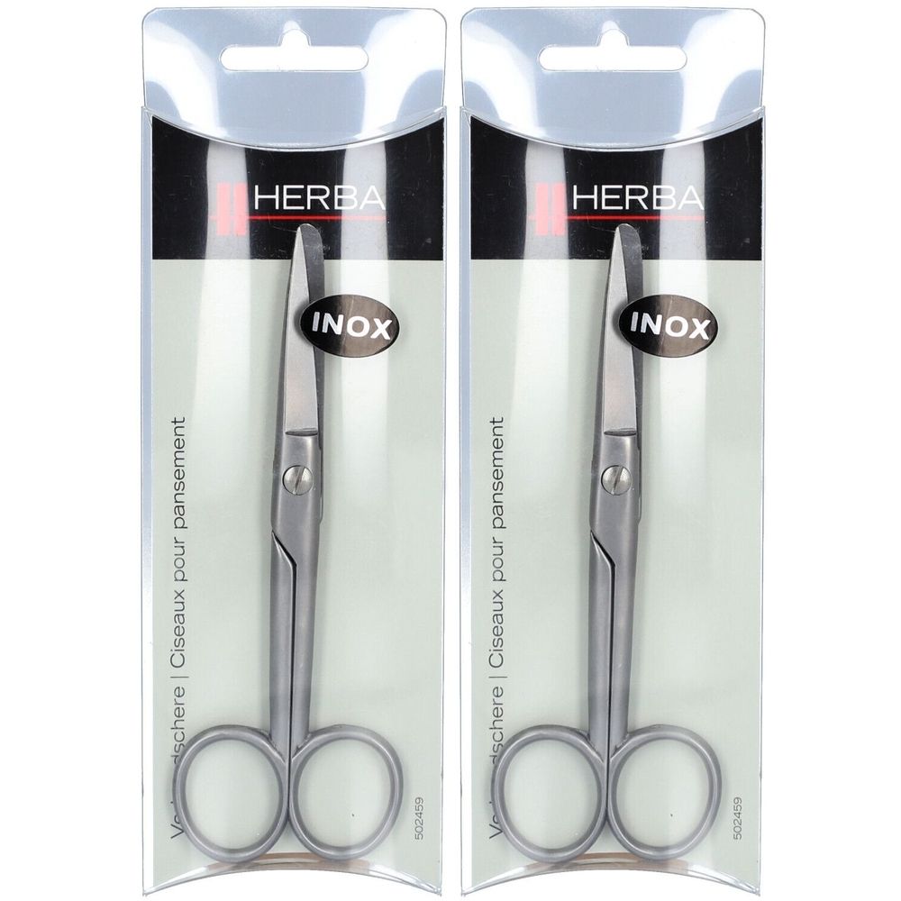 Twee HERBA Inox pleisterscharen in blisterverpakking. Metalen scharen met afgeronde punten. Opschrift: INOX.