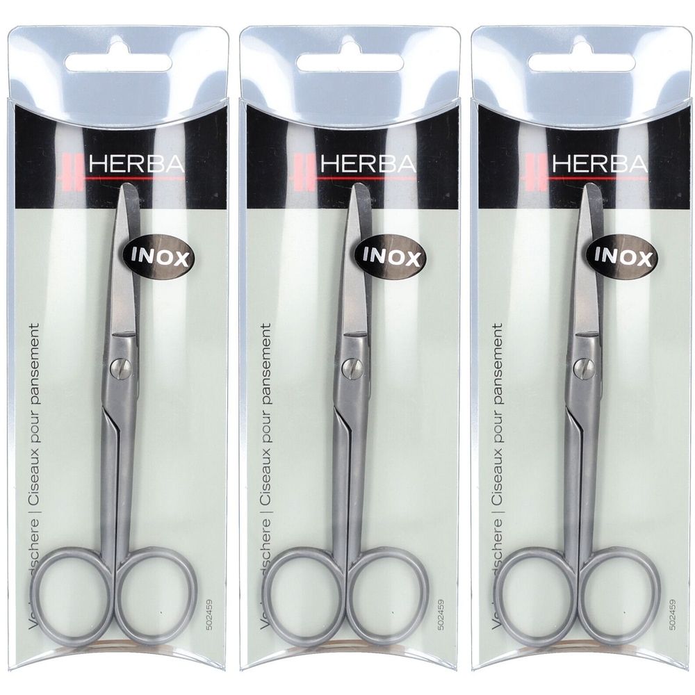 Drie HERBA Inox pleisterscharen in blisterverpakking. Met metalen schaar met afgeronde punten. Verpakking met ophanginrichting.