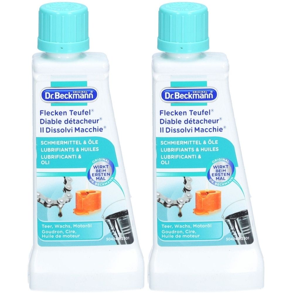 Twee flessen Dr. Beckmann Flecken Teufel. Witte flessen met blauwe doppen. Productnamen en logo's zichtbaar op de etiketten.