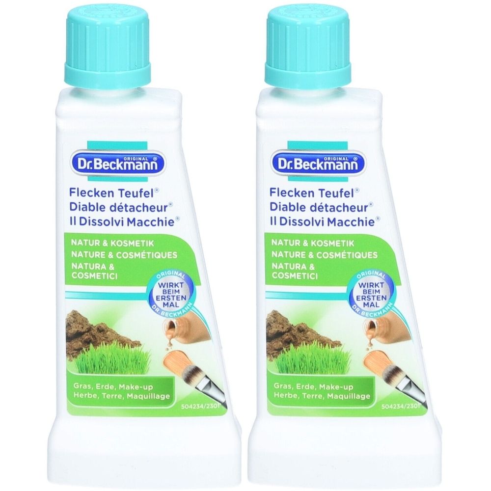 Twee flessen met blauwe dop. Opschrift: Dr. Beckmann Flecken Teufel. Illustratie: Gras, Aarde, Make-up.