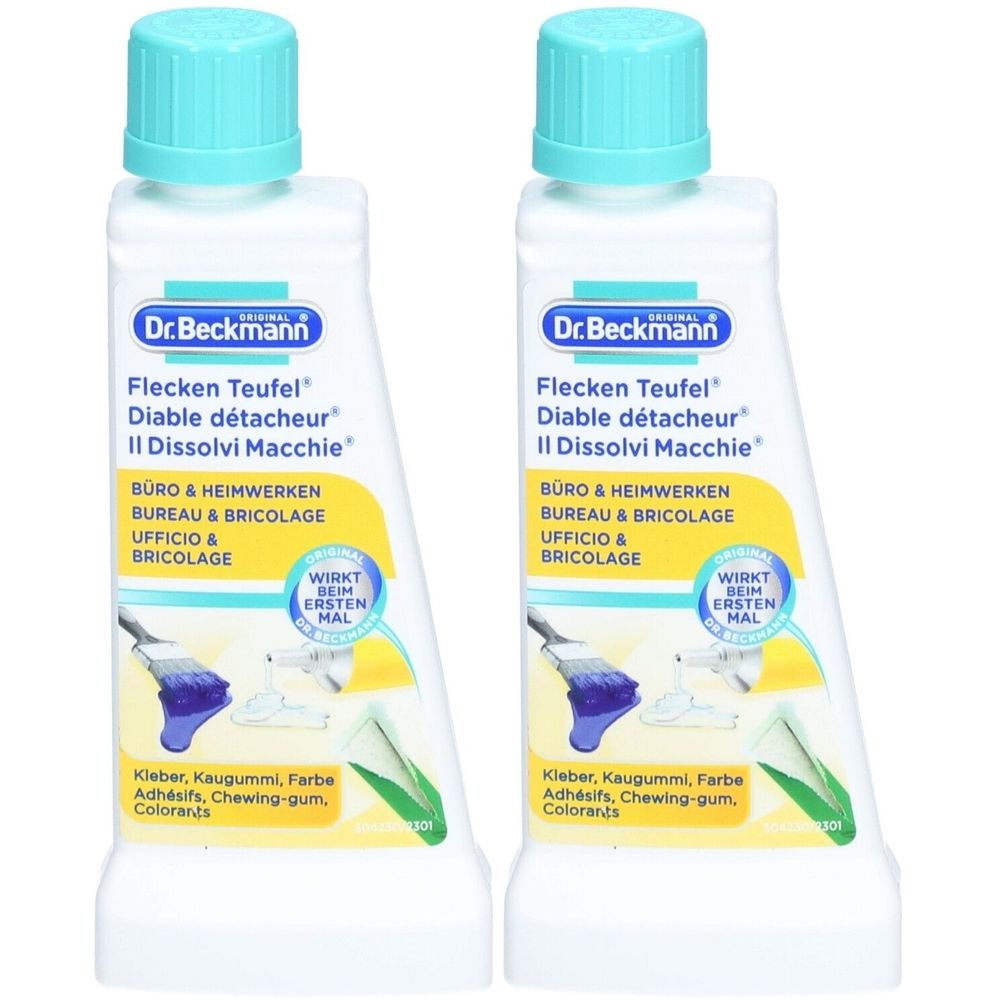 Twee flessen Dr. Beckmann Flecken Teufel. Witte flessen met turquoise doppen. Opschrift: Bureau & Bricolage, lijm, kauwgom, kleurstoffen.
