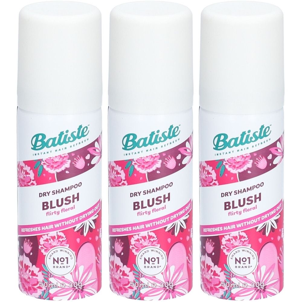 Trois flacons de shampooing sec Batiste Blush. Design floral rose et blanc. Inscription visible.