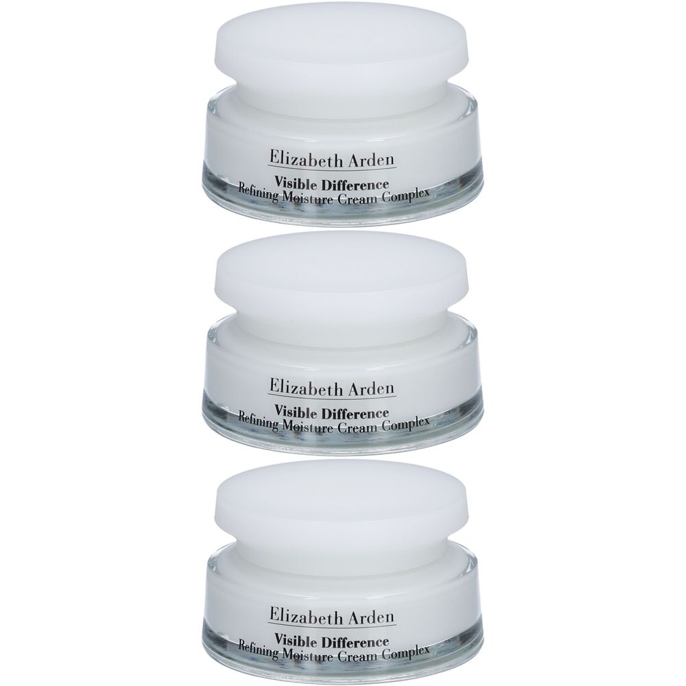 Drie crèmetubes met witte deksels. Labels: "Elizabeth Arden Visible Difference". 