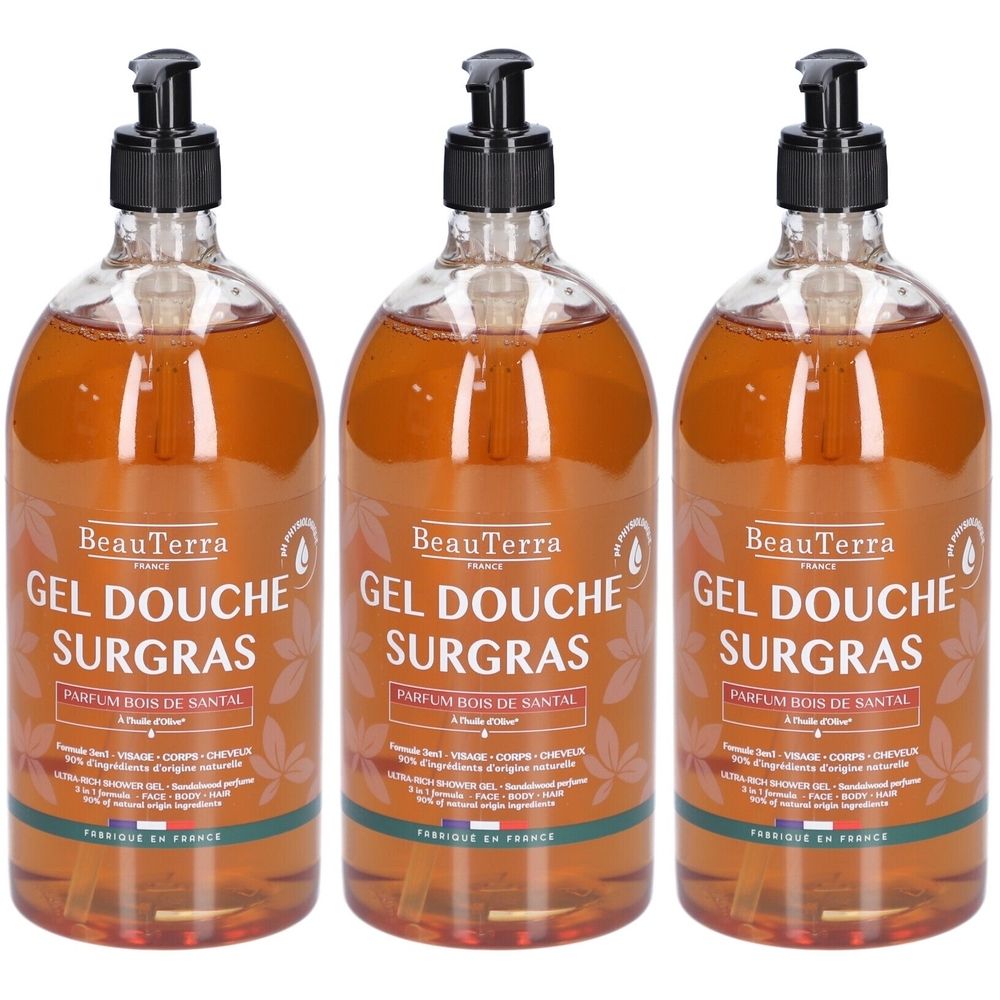 Drie flessen BeauTerra Gel Douche Surgras. Transparante gel met zwarte pomp. Opschrift: Parfum Bois de Santal.