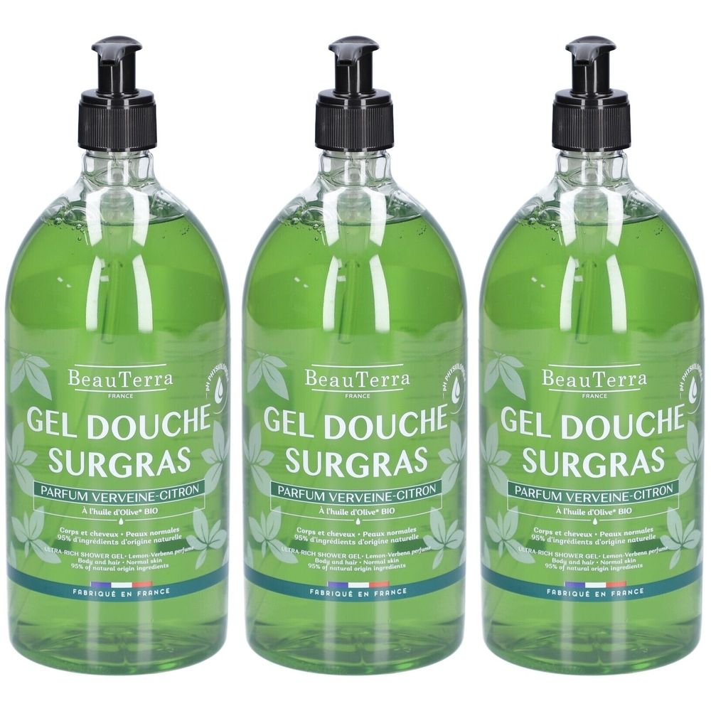 Drie groene flessen met zwarte pomp. Op elke fles staat "GEL DOUCHE SURGRAS" en "PARFUM VERVEINE CITRON". 