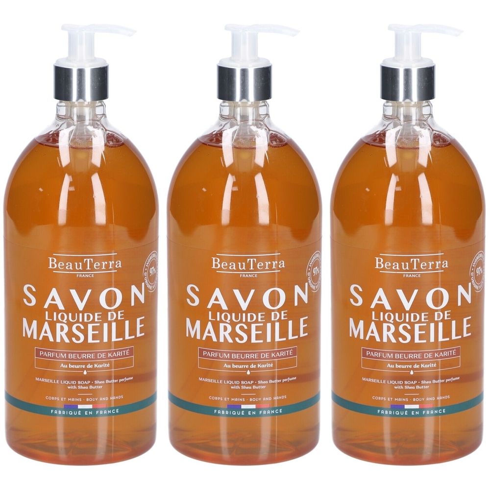 Trois flacons de savon liquide. Inscription: BeauTerra Savon Liquide de Marseille. Avec distributeur. Couleur ambrée.