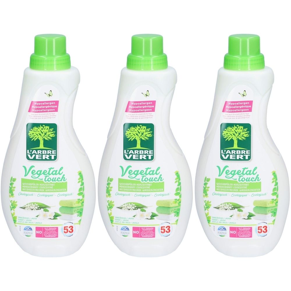 Drie flessen wasverzachter. Wit, met groene dop. Opschrift: L'ARBRE VERT, Vegetal touch. Met certificeringen.