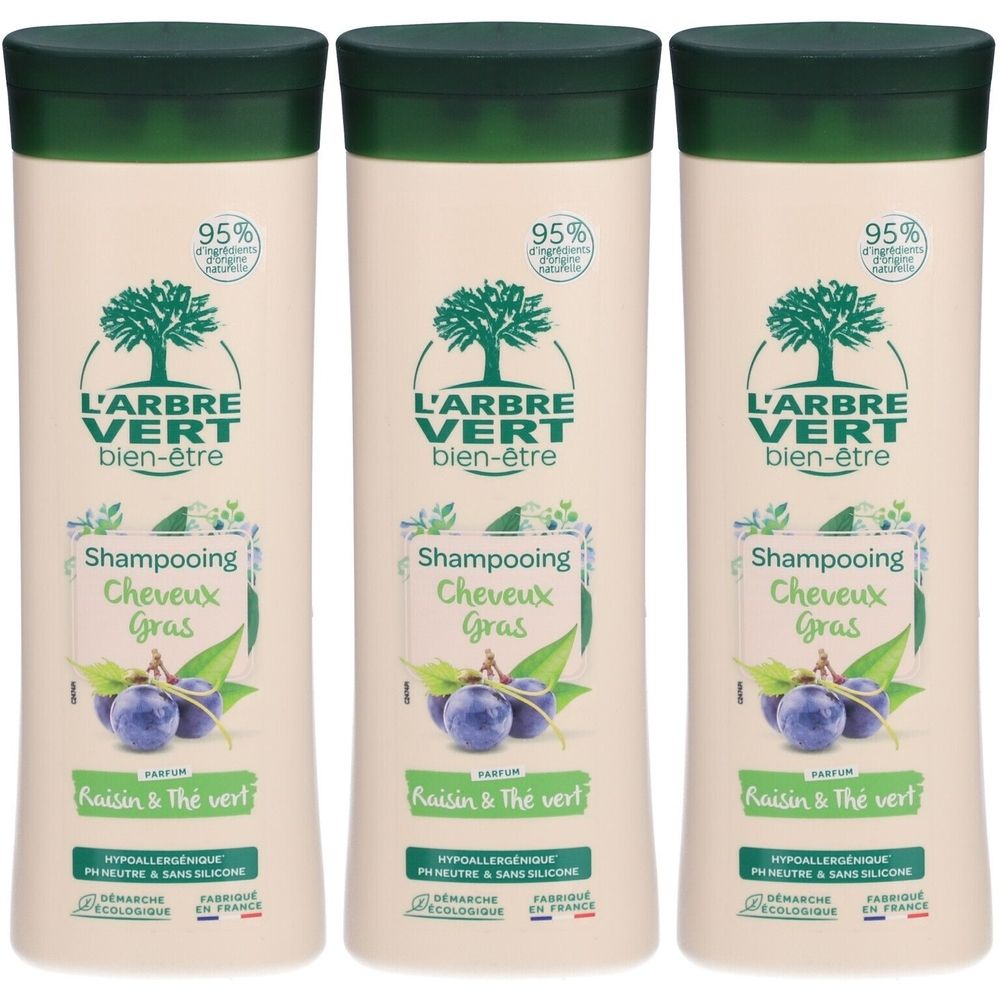 Drie flessen shampoo, L'ARBRE VERT, voor vet haar. Groene dop, witte fles, boomlogo. Tekst: Shampooing Cheveux Gras, Raisin & Thé vert.