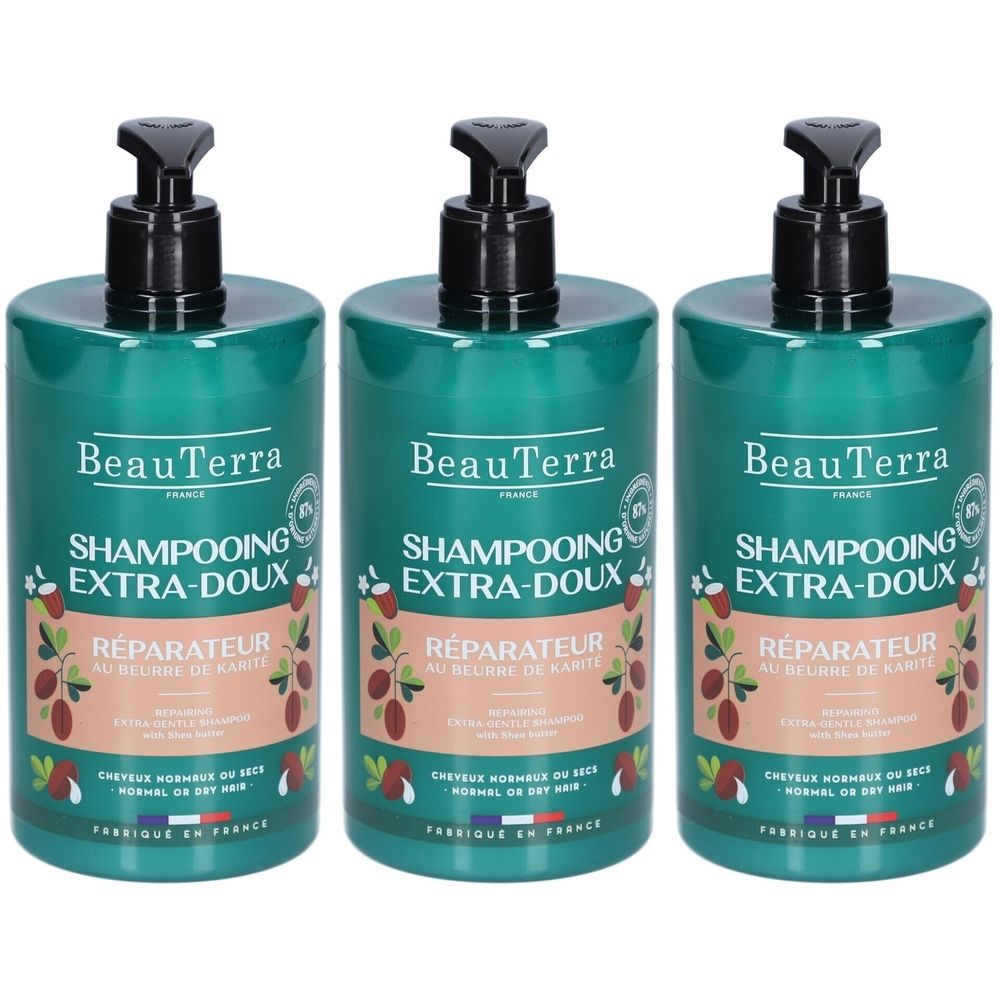 Drie groene shampoo flessen met zwarte pomp. Opschrift: BeauTerra, Shampooing Extra-Doux, Réparateur.