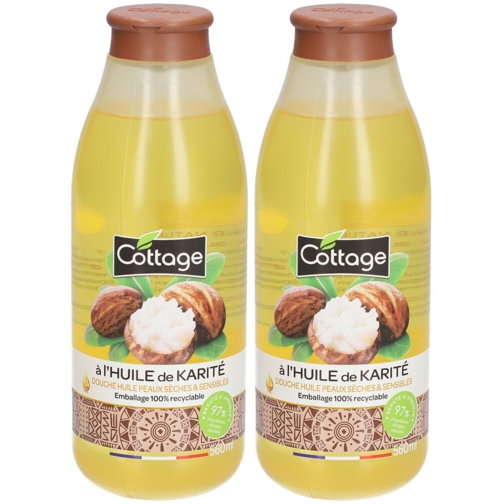 Twee flessen douche-olie. Opschrift: Cottage, à l'huile de Karité. Verpakking 100% recyclebaar. 97%.
