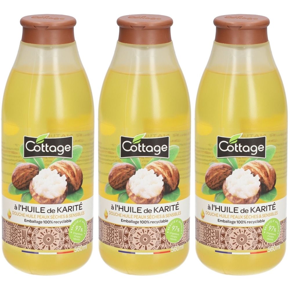Drie flessen met bruine doppen en gele vloeistof. Labels met "Cottage" en "à l'Huile de Karité". 