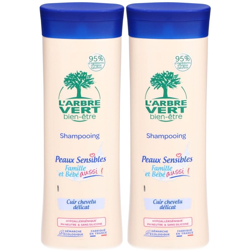 Deux flacons de shampooing L'ARBRE VERT, blanc et bleu. Pour peaux sensibles, famille et bébé. Label écologique.