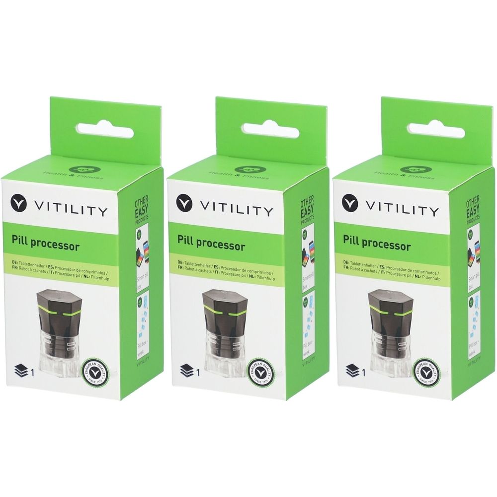 Trois boîtes de VITILITY Pillenbox. Chaque boîte présente un processeur de pilules. Emballage vert et blanc avec nom et logo du produit.