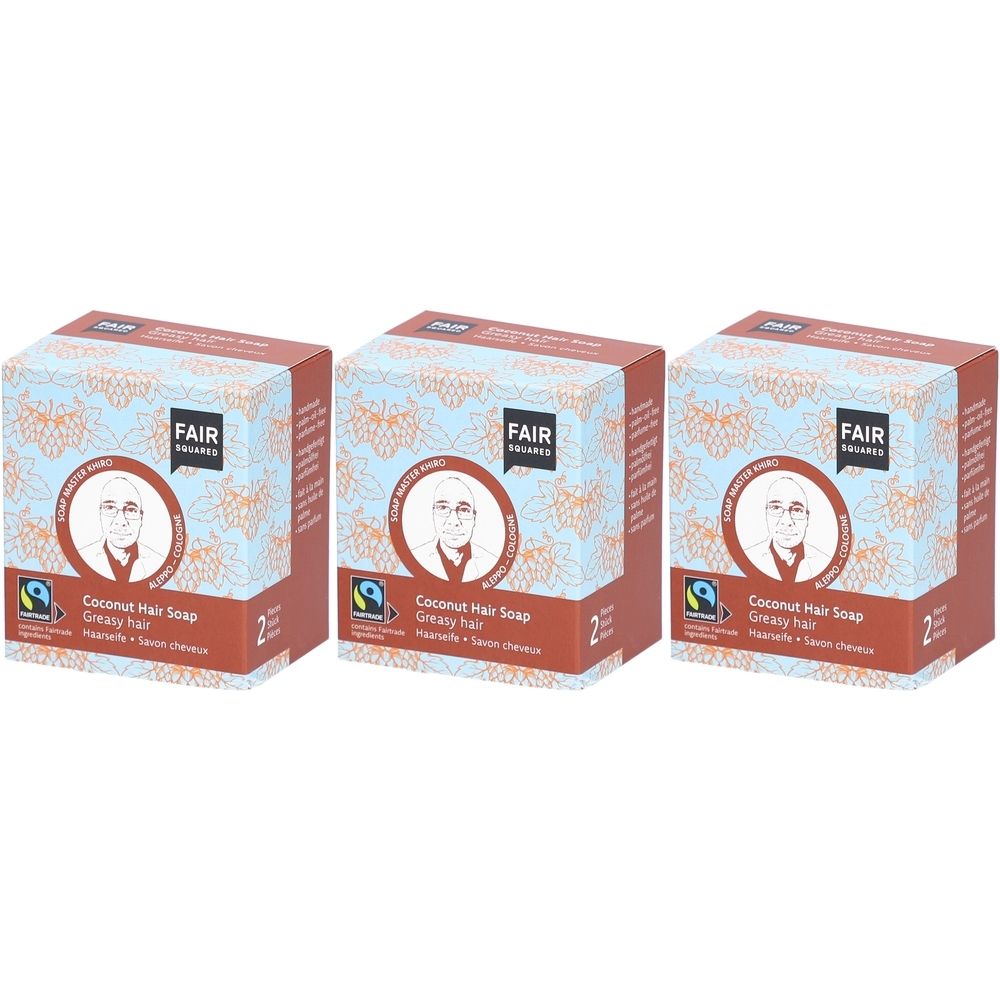 Drie vierkante verpakkingen met FAIR SQUARED logo en productinformatie. Opschrift: Coconut Hair Soap, voor vet haar.