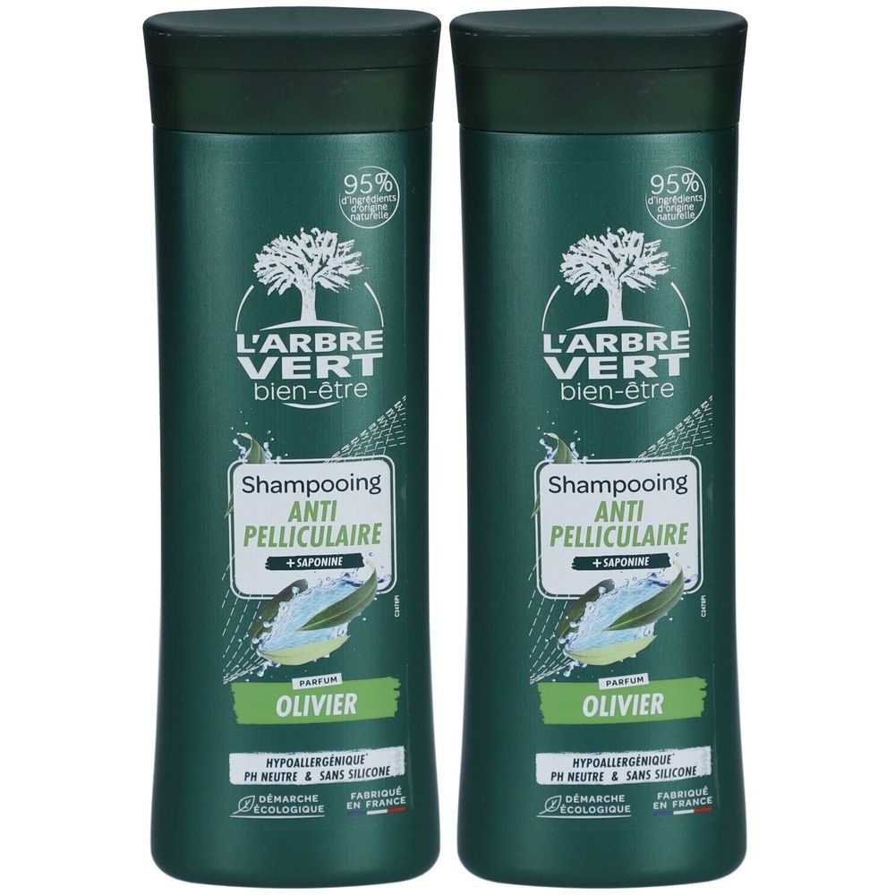 Twee groene shampoo flessen. Opschrift: L'ARBRE VERT, Anti-roos shampoo, Olivier. Met eco-certificering en 95% ingrediënten van natuurlijke oorsprong.