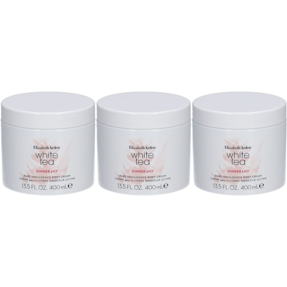 Trois pots blancs avec couvercles. Inscription: White Tea Ginger Lily, Pure Indulgence Body Cream. 13.5 FL.OZ. 400ml.