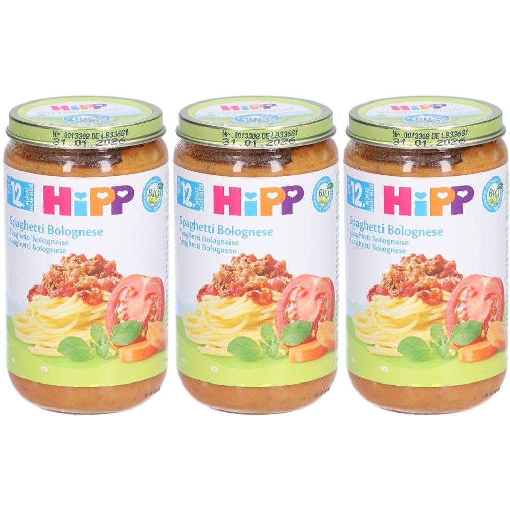 Drie potjes HIPP Spaghetti Bolognese voor baby's vanaf 12 maanden. Potjes met deksels, etiket met productafbeelding en tekst.