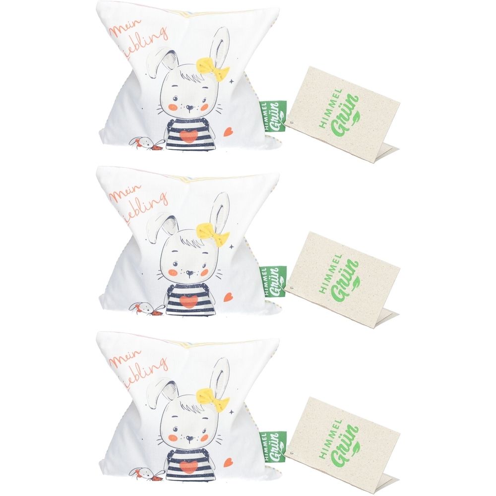 Trois coussins aux pépins de raisin avec motif lapin et étiquette "HIMMELGRÜN". Coussin avec inscription "Mein Liebling".
