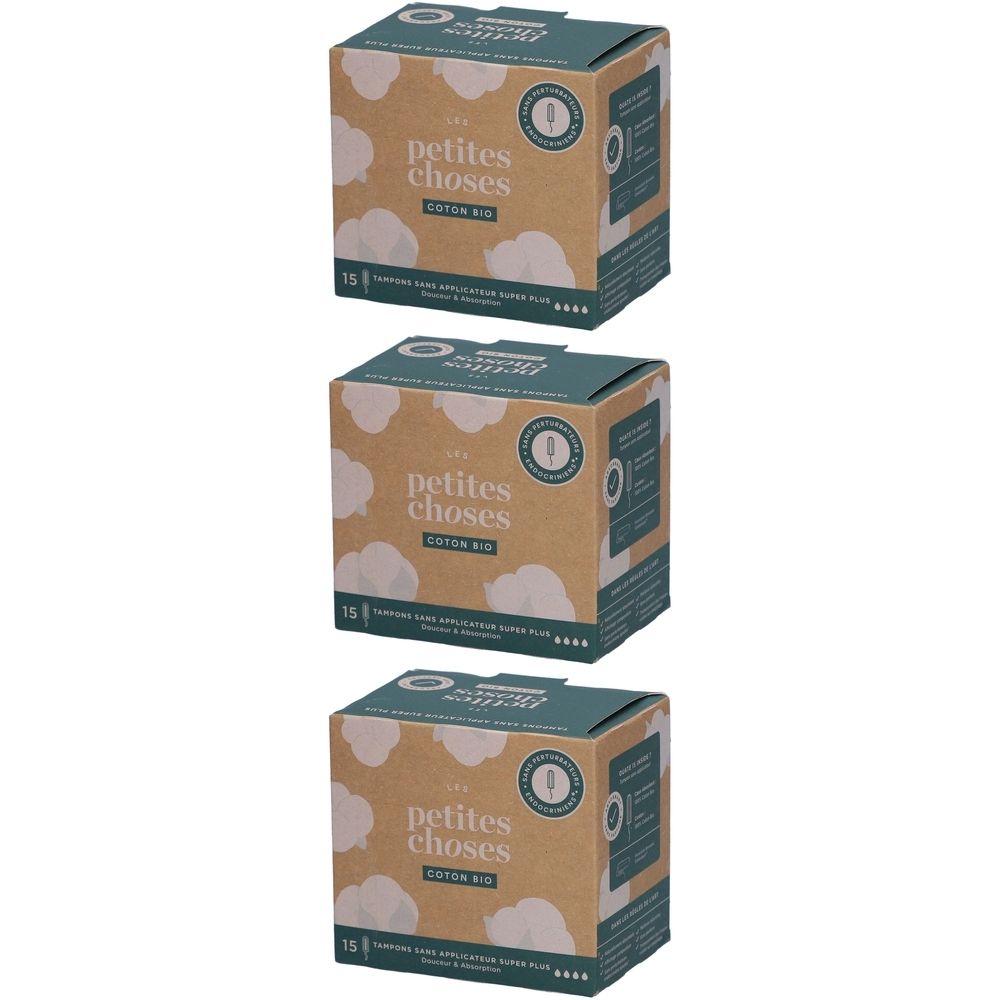 Drie dozen tampons. Opschrift: petites choses, coton bio, 15 stuks. Verpakking van bruin karton met groene elementen.