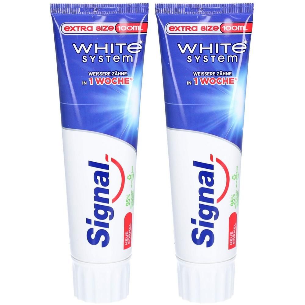 Twee tubes Signal White System tandpasta. Blauw-witte verpakking met rood logo. Opschrift: Extra Size 100ml.